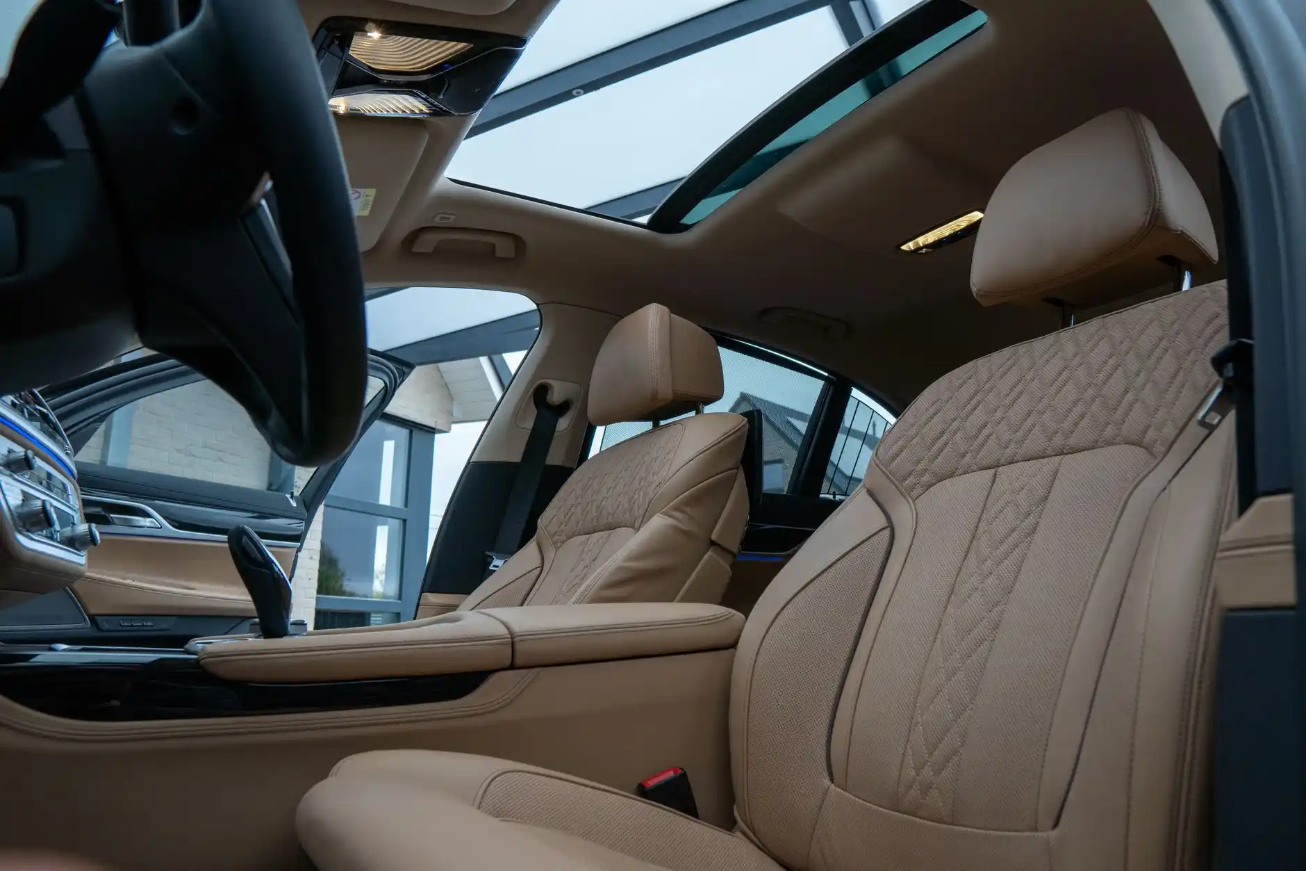 interior lineup collage showing cream leather luxury sedan seats, executive SUV captain chairs, stretch limousine ambient lighting, and a premium Sprinter van cabin with wood ac...